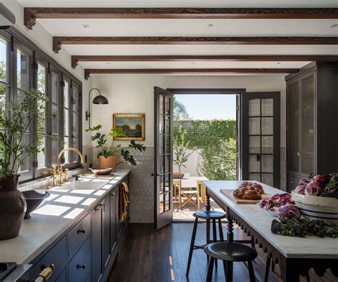 Renovated Kitchen Of A 1924 French Eclectic Residence Opening Up To The