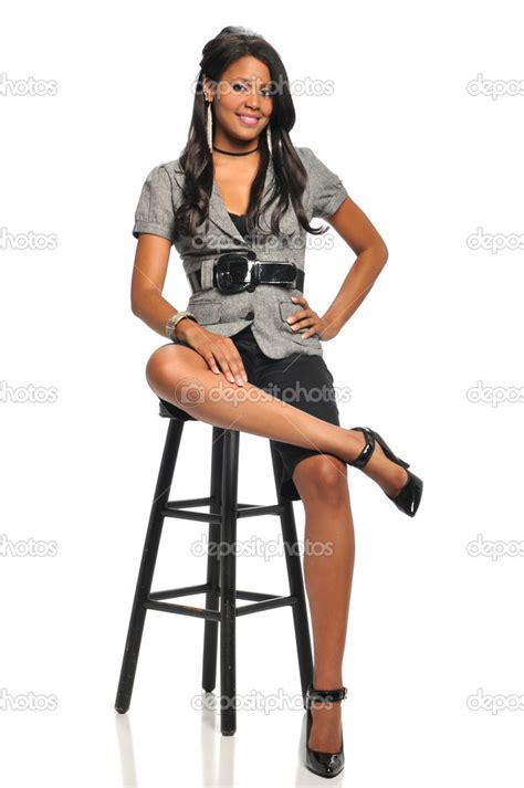 Woman On Posing Sitting On A Stool Stock Photo By Carlosphotos 13911172