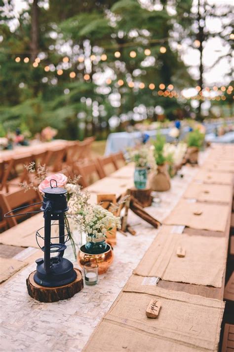 A Camping Themed Wedding In The Woods With Blue And Pink Accents