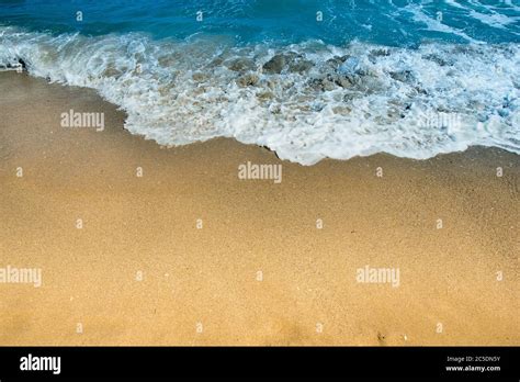 Wave Foam On Seashore Seascape Seaside Sand With Copy Space Tropical