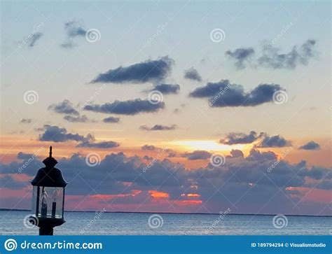 Light Red Sunset Beautiful View Panorama Blue Sea With Gray Cloud Sky