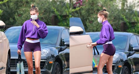 Hailey Bieber Wears Purple Sweatshirt And Shorts To Work Out