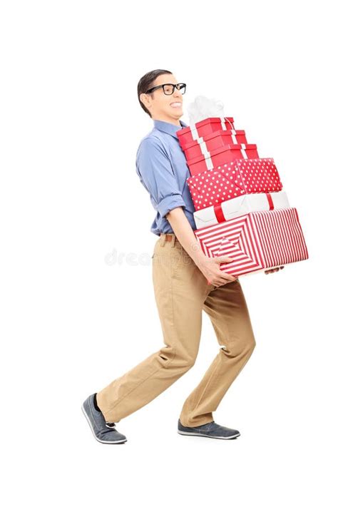 Man Carrying A Heavy Load Of Presents Stock Photo Image Of Adult