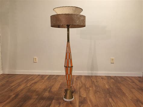 If you really want a modern look choose a floor lamp that is made out of wood. SOLD - Cool Mid Century Ceramic Floor Lamp - Modern to Vintage