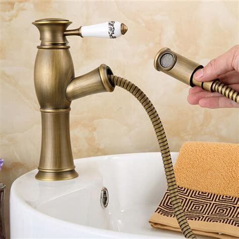 Dfi single hole bathroom faucet this vintage design faucet that makes a great centerpiece in any farmhouse or traditional bathroom. 2016 Brass ceramic Antique pull out basin faucet bathroom ...