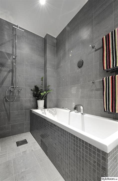 I wish i had the foresight to take a before photo but, since i did not, just know that it was not filled with delightful grey bathroom ideas, but rather a very retro space except not in that hip and cool way that people are. badkar,badrum | Grey bathroom tiles, Bathroom tile designs ...
