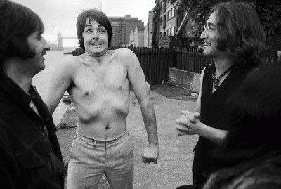 A Shirtless Paul Mccartney With His Fellow Beatles At The Wapping Pier Head In London July