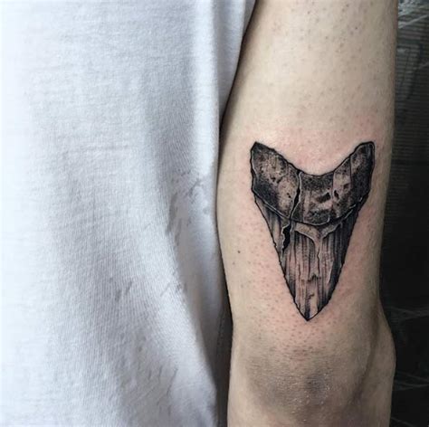 A tooth tattoo is a relatively recent invention in cosmetic dentistry that is considered dental bling. much like a skin tattoo, a tooth tattoo is a permanent image that is added to the tooth. This Year's 60 Most Amazing Tattoo Designs for Men ...