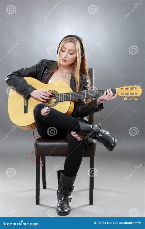 A Beautiful Young Blonde With A Classical Guitar Stock Image Image Of