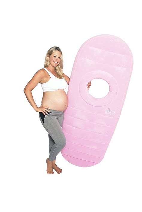 The Cozy Bump Pregnancy Pillow Lets You Sleep On Your Belly While Pregnant