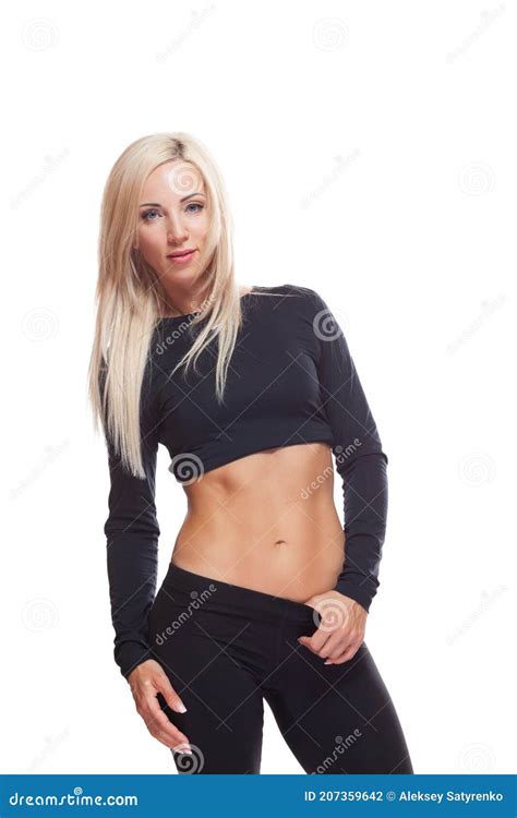 Blonde Fitness Woman Standing And Showing Off Her Toned And Muscular