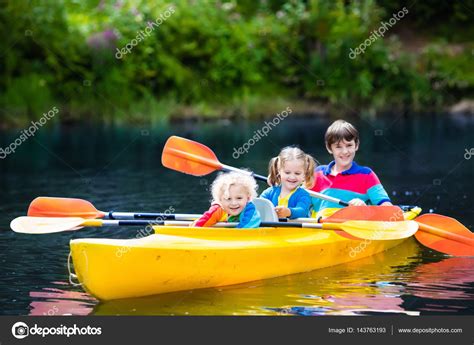 Kids Kayaking On A River — Stock Photo © Famveldman 143763193