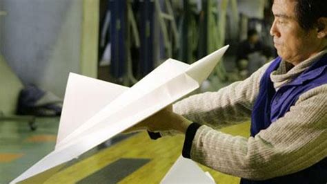 japanese origami airplane enthusiast breaks world record for longest paper plane flight