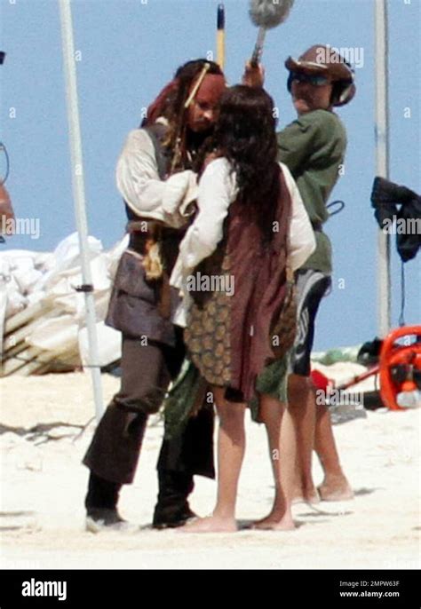 exclusive johnny depp and penelope cruz film a kissing scene on a deserted island for the