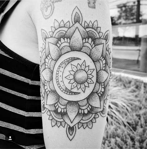 Sun and moon mandala tattoo by Casey Hart at Rose Red Tattoo in