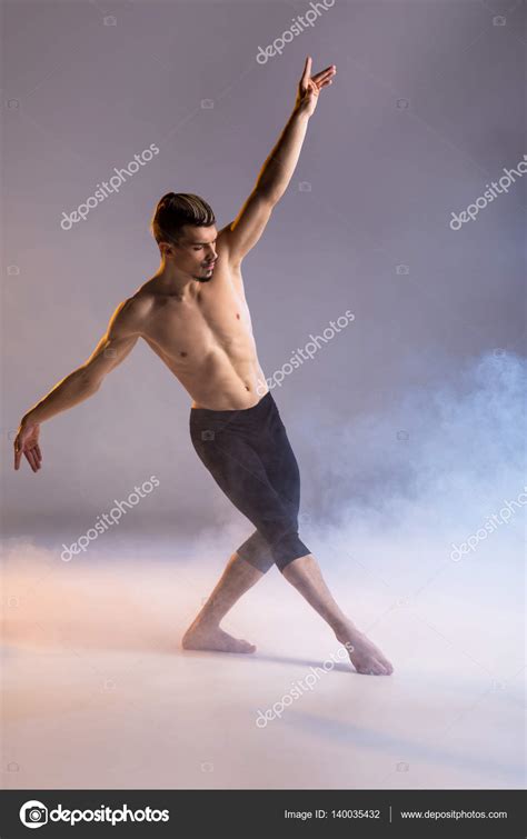 Young Man Dancing — Stock Photo © Olgazakrevskaya 140035432