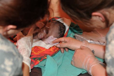 Boy a/c charlotte, north carolina. Army Reserve Nurse Delivers Baby in Rural Uganda - United ...