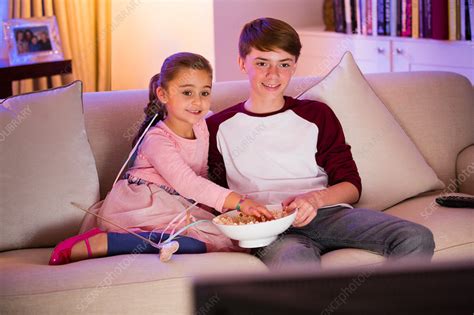 Brother And Sister Watching Tv Stock Image F0160488 Science Photo Library