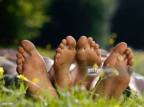 Laying Bare In Grass Photos Et Images De Collection Getty Images
