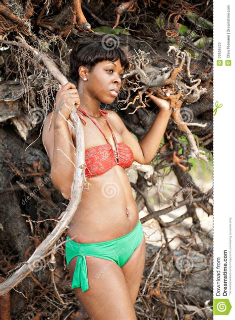 Are you an arya, a clarissa, or a buffy? Black woman in bikini stock photo. Image of slim, trees ...