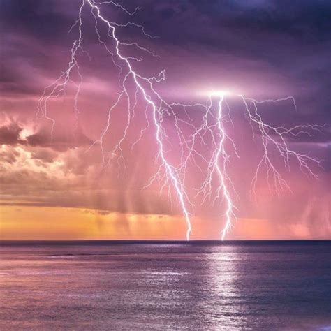Tropical Ocean Storm And Lightning Strike At Sunset In Africa Nature