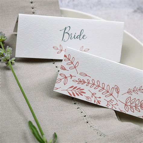 A card with someone's name on it, put at the place at a table where they if player fails to place card of same suit in numerical order, opponent can knock (on table) forcing other. Personalised Simple Foliage Place Setting Cards By Littlebird Weddings | notonthehighstreet.com
