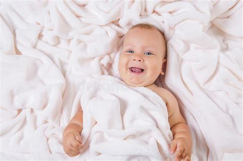 Cute Smiling Baby Under Towel After Bath Stock Photo Image Of Girl