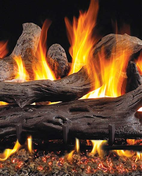 Gas log sets with sand over the burner can have the sand melt and plug the burner ports over time. Gas Logs & Fireplace Accessories | Allen TX | Firehouse Texas