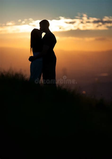 Kissing Couple Silhouette Sunset