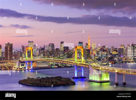 Tokyo Japan Skyline With Rainbow Bridge And Tokyo Tower Stock Photo