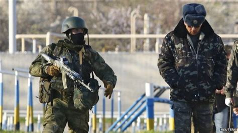Russian troops storm Ukrainian bases in Crimea - BBC News
