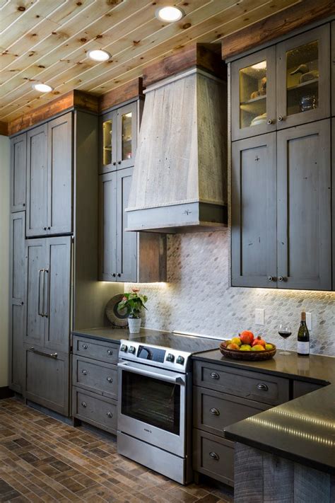 I came across an idea that used bricks as a backsplash. brick backsplash kitchen with pendant lighting and
