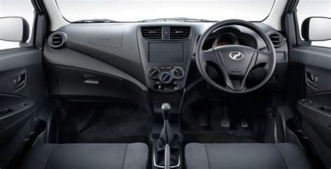 Chrome handles & side skirt. Perodua Axia press shot E interior