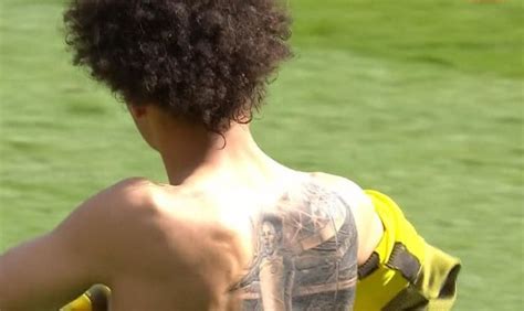 What's that tattoo of? sane: Leroy Sané tattoo: Manchester City man's back tattoo ...