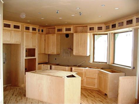 For kitchen cabinets that can withstand years of use, you want to use a hardwood for the face frames and doors. Unfinished Maple Kitchen Base Cabinets — Schmidt Gallery ...