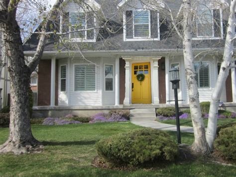 Blue house, white trim, yellow door. Honey I'm Home: Deciding on a Color for a Front Door