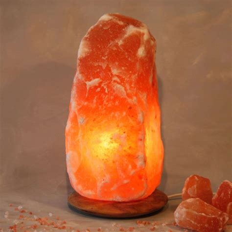 Rock lighted salt crystal with wooden base | Lights.co.uk