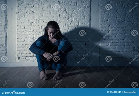 Sad Lonely Woman Suffering From Depression Sitting Alone And Hopeless