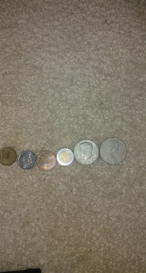 Coins From Left To Right Are 10 Russian Roubles 50
