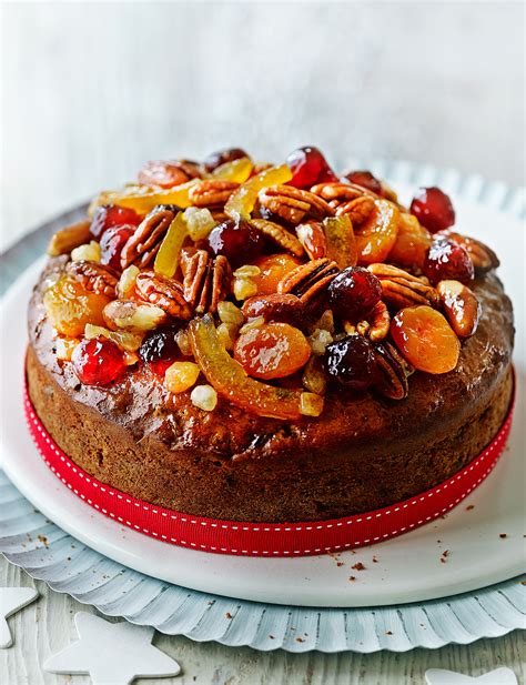 12) sprinkle over the grated chocolate, slice the pudding into 12 rectangular pieces and serve immediately. Christmas fruit cake with ginger | Sainsbury's Magazine