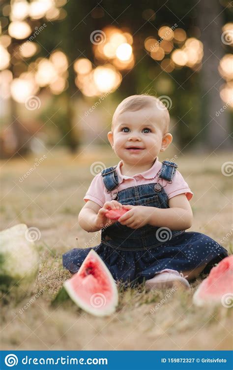 Portrait Of Beautiful Baby Girl Eating Watermelon Child