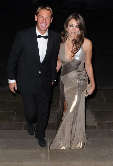 Elizabeth Hurley Cleavage And Leggy Candids At Operation Smile Ball