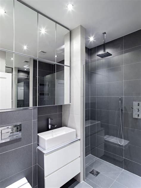 Bathroom 1 has a white wall hung vanity with caesarstone dreamy marfil. Gray Bathroom Tiles | Houzz