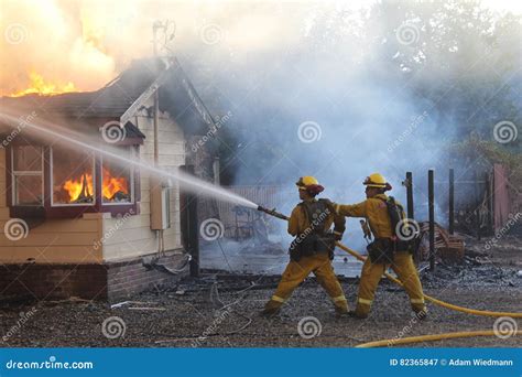 Firefighters Battling A Structure Fire Editorial Photography Image Of