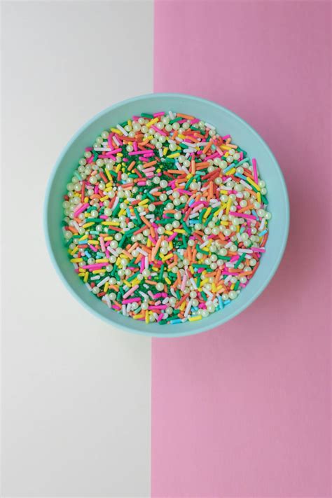 Pink White Yellow And Green Round Candies In Pink Bowl · Free Stock Photo