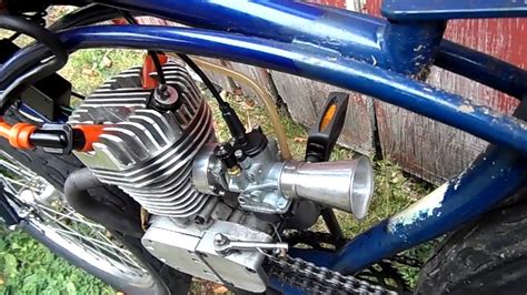 The correct size rider is a person who is between 5'2 to about 6'2 tall. Close up of the twin ignition motorized bicycle engine ...