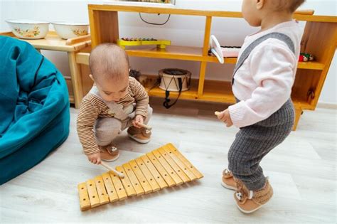 Premium Photo Toddler Playing Xylophone