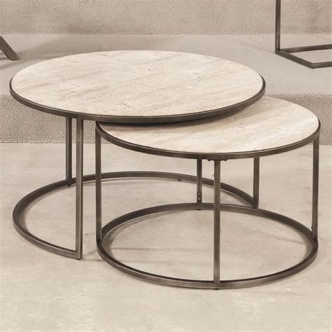 Nesting tables like these white stunners can help keep a space both multifunctional and stylish. Hammary Modern Basics Round Nesting Cocktail Tables ...