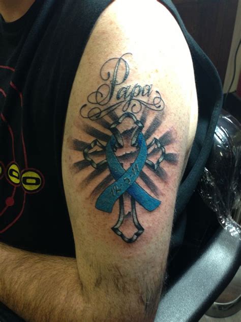 They have become very popular as they combine style and a small element of social service together. Cross with colon cancer ribbon | Colon Cancer Ribbon ...
