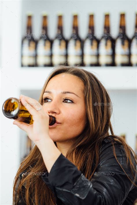 Woman Drinking Bottle Beer Stock Photo By Clickandphoto